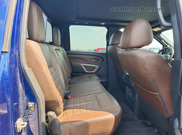 1N6AA1ED1MN523889 2021 NISSAN TITAN Blue Widok wnętrza z tyłu
