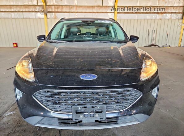 1FMCU9H65MUA64592 2021 FORD ESCAPE Black Widok z tyłu