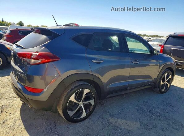 KM8J33A29GU112842 2016 HYUNDAI TUCSON Gray Delantero derecho