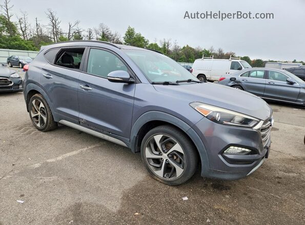 KM8J3CA28HU304044 2017 HYUNDAI TUCSON Gray Widok z przodu