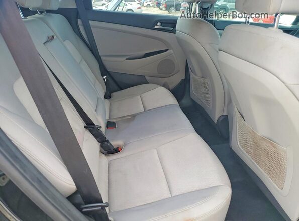 KM8J23A49HU494988 2017 HYUNDAI TUCSON Black Vista del compartimento del motor
