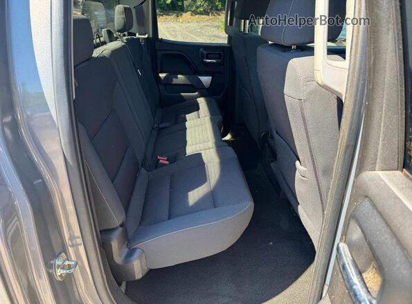 1GCVKREC8HZ144006 2017 CHEVROLET SILVERADO Серый Вид салона спереди