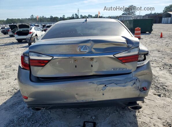 58ABK1GG5JU099098 2018 LEXUS ES Серебряный Вид сзади