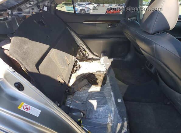 58ABK1GG6HU040653 2017 LEXUS ES Gold Rear seats view