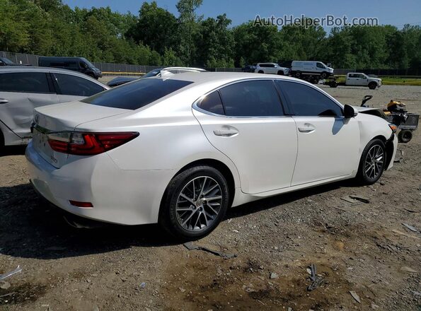 58ABK1GG7HU051032 2017 LEXUS ES Белый Вид панели приборов