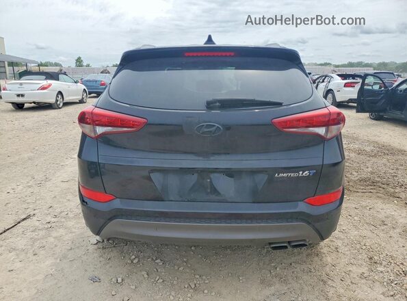 KM8J33A2XGU146028 2016 HYUNDAI TUCSON Черный Вид салона спереди