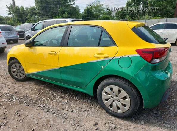 3KPA25AB8JE119984 2018 KIA RIO Yellow Trasero derecho