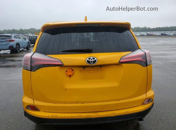 JTMBFREV6JD256623 2018 TOYOTA RAV4 Yellow Вид салону спереду