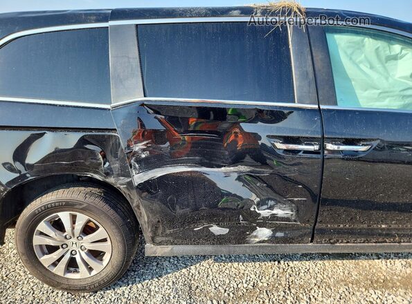 5FNRL5H34HB025815 2017 HONDA ODYSSEY Black Widok wnętrza z tyłu