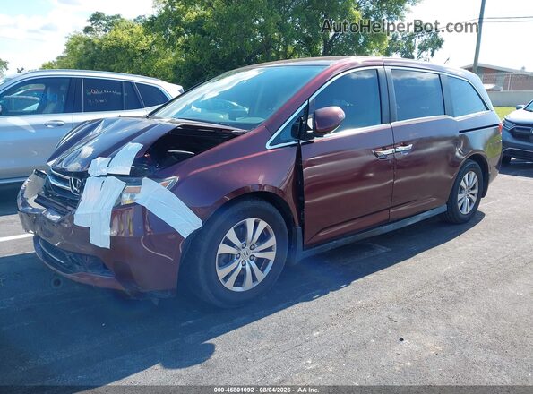 5FNRL5H46GB086218 2016 HONDA ODYSSEY Red Vista tres cuartos delantera izquierda