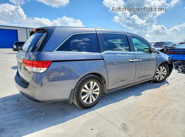 5FNRL5H62GB142298 2016 HONDA ODYSSEY Gray Trasero derecho