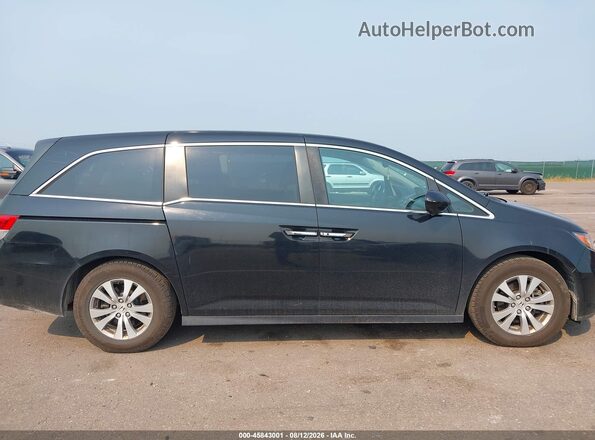 5FNRL5H67GB093843 2016 HONDA ODYSSEY Черный Вид задней части салона