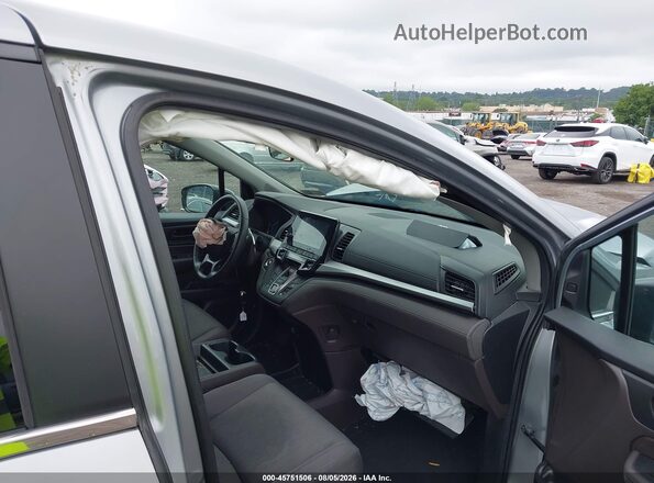 5FNRL6H53KB121210 2019 HONDA ODYSSEY Серебряный Вид салона спереди