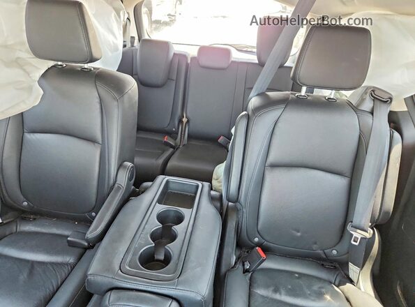 5FNRL6H63SB009872 2025 HONDA ODYSSEY Black Rear seats view