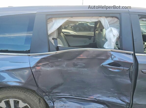 5FNRL6H64SB069997 2025 HONDA ODYSSEY Gray Widok wnętrza z tyłu