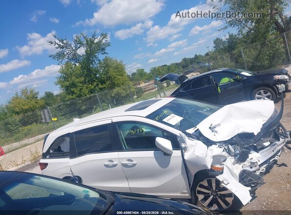 5FNRL6H64SB073340 2025 HONDA ODYSSEY White Widok wnętrza z tyłu