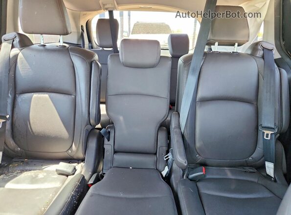 5FNRL6H71JB064974 2018 HONDA ODYSSEY Black Rear seats view