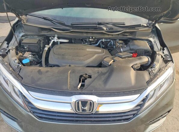 5FNRL6H73JB010110 2018 HONDA ODYSSEY Green Rear interior view