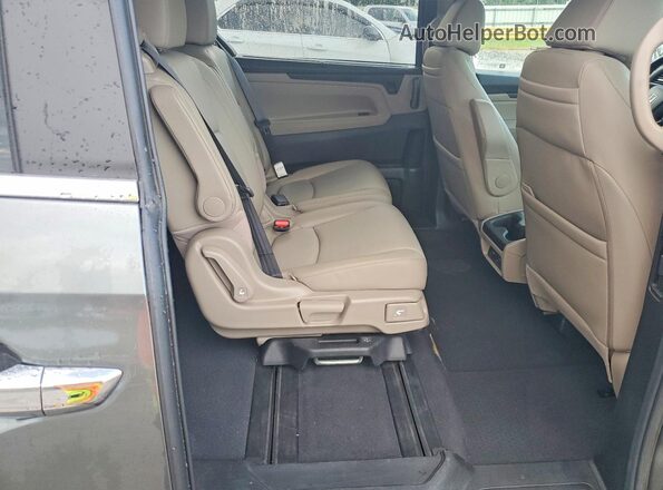 5FNRL6H73JB010110 2018 HONDA ODYSSEY Green Rear seats view