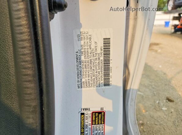 5FNRL6H85RB022828 2024 HONDA ODYSSEY White VIN sticker view