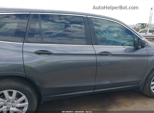 5FNYF5H18KB016883 2019 HONDA PILOT Gray Widok wnętrza z tyłu