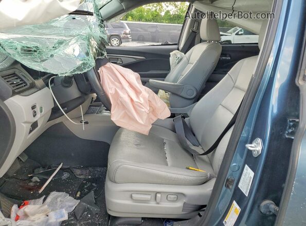 5FNYF5H20MB028974 2021 HONDA PILOT Blue Vista interior delantera