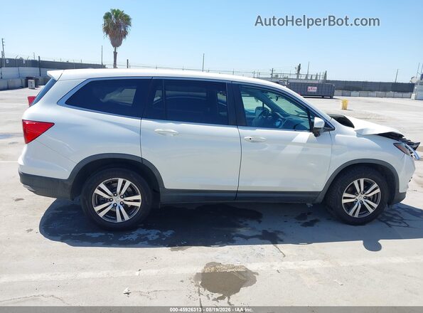 5FNYF5H41JB026664 2018 HONDA PILOT White Սալոնի հետևի տեսք