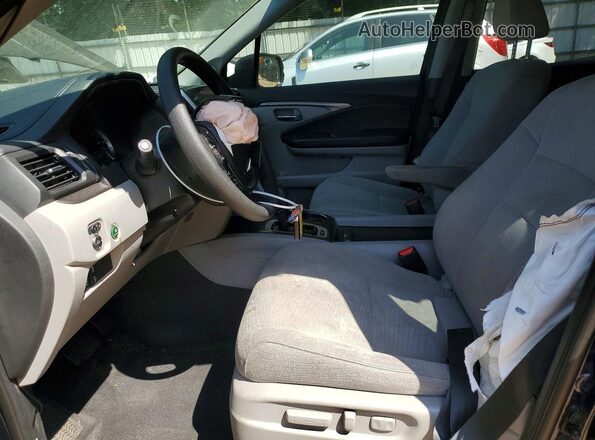5FNYF5H45JB000360 2018 HONDA PILOT Blue Front interior view