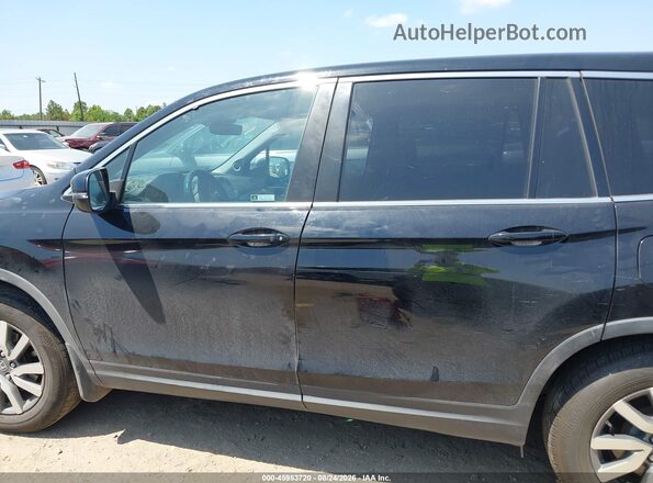 5FNYF5H50KB029050 2019 HONDA PILOT Black Widok wnętrza z tyłu