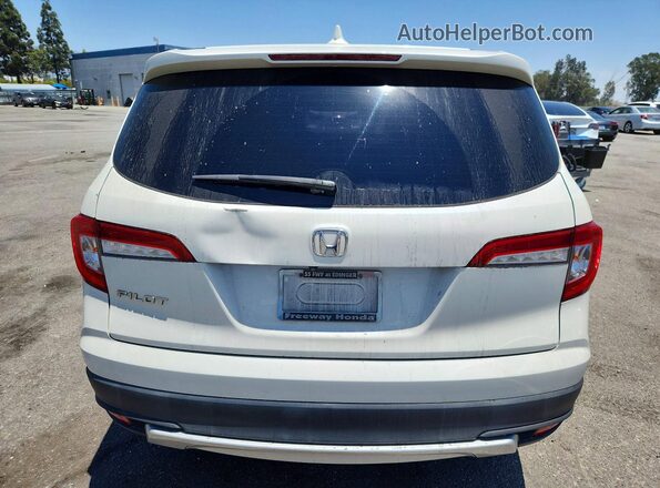 5FNYF5H51KB025928 2019 HONDA PILOT Белый Вид сзади