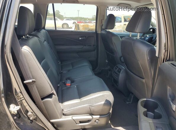 5FNYF5H52KB036050 2019 HONDA PILOT Black Rear interior view