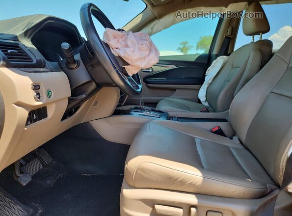 5FNYF5H53MB043124 2021 HONDA PILOT Burgundy Front interior view