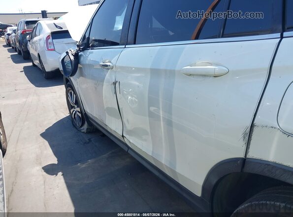 5FNYF5H59JB031071 2018 HONDA PILOT White Widok wnętrza z tyłu