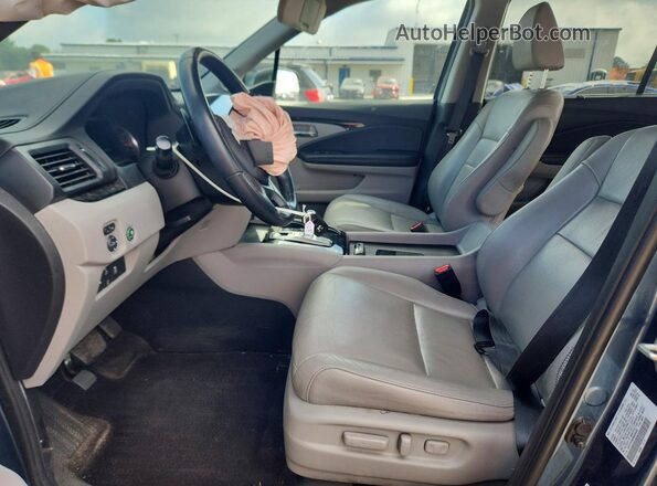 5FNYF5H63MB004803 2021 HONDA PILOT Blue Front interior view