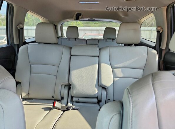 5FNYF5H69HB021658 2017 HONDA PILOT Blue Rear seats view