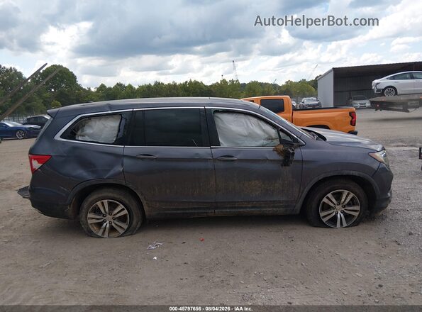 5FNYF5H72JB014694 2018 HONDA PILOT Gray Widok wnętrza z tyłu