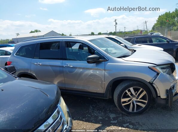 5FNYF6H00HB102534 2017 HONDA PILOT Gray Սալոնի հետևի տեսք