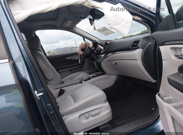 5FNYF6H29MB048145 2021 HONDA PILOT Blue Front interior view