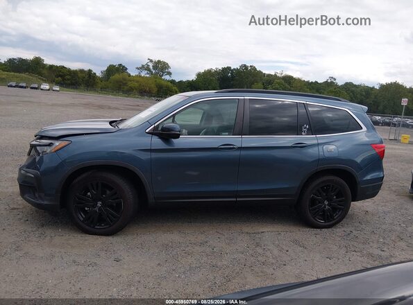5FNYF6H29MB048145 2021 HONDA PILOT Blue 360 interior view