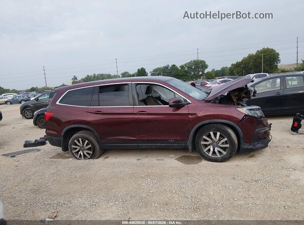 5FNYF6H31KB083185 2019 HONDA PILOT Burgundy Rear interior view