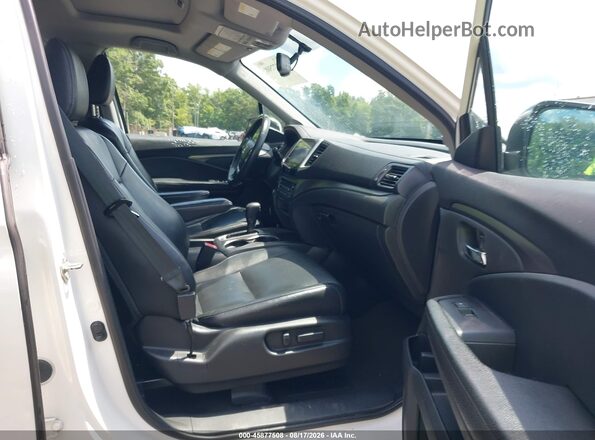 5FNYF6H52HB036581 2017 HONDA PILOT White Widok wnętrza z przodu