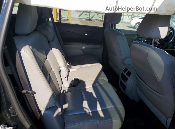 5FNYF6H53GB095346 2016 HONDA PILOT Black Rear interior view