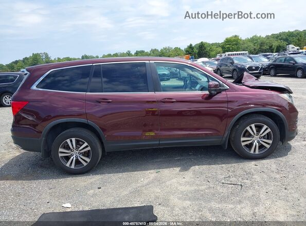 5FNYF6H54HB085572 2017 HONDA PILOT Бордовый Вид задней части салона