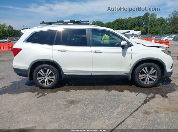 5FNYF6H57GB096970 2016 HONDA PILOT Белый Вид задней части салона