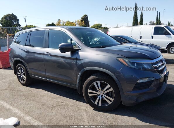 5FNYF6H57HB091382 2017 HONDA PILOT Gray Rear interior view