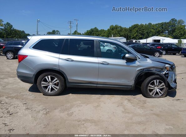 5FNYF6H57JB064110 2018 HONDA PILOT Gray Widok wnętrza z tyłu