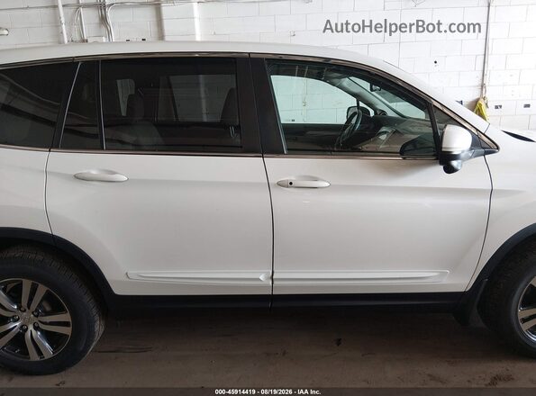 5FNYF6H58HB067494 2017 HONDA PILOT White Rear interior view