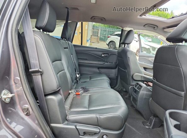 5FNYF6H5XKB076592 2019 HONDA PILOT Charcoal Rear interior view