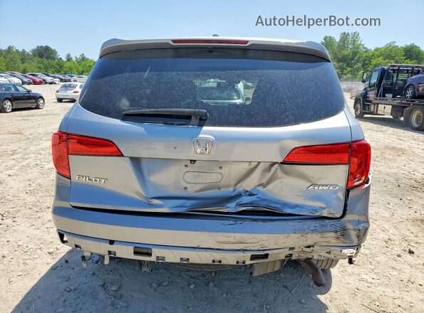 5FNYF6H65JB068570 2018 HONDA PILOT Silver Rear view