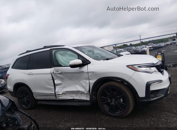 5FNYF6H73NB003909 2022 HONDA PILOT White Rear interior view